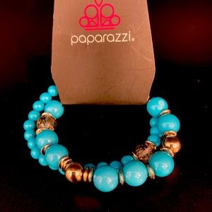 Paparazzi blue and gold bracelets . Elastic band